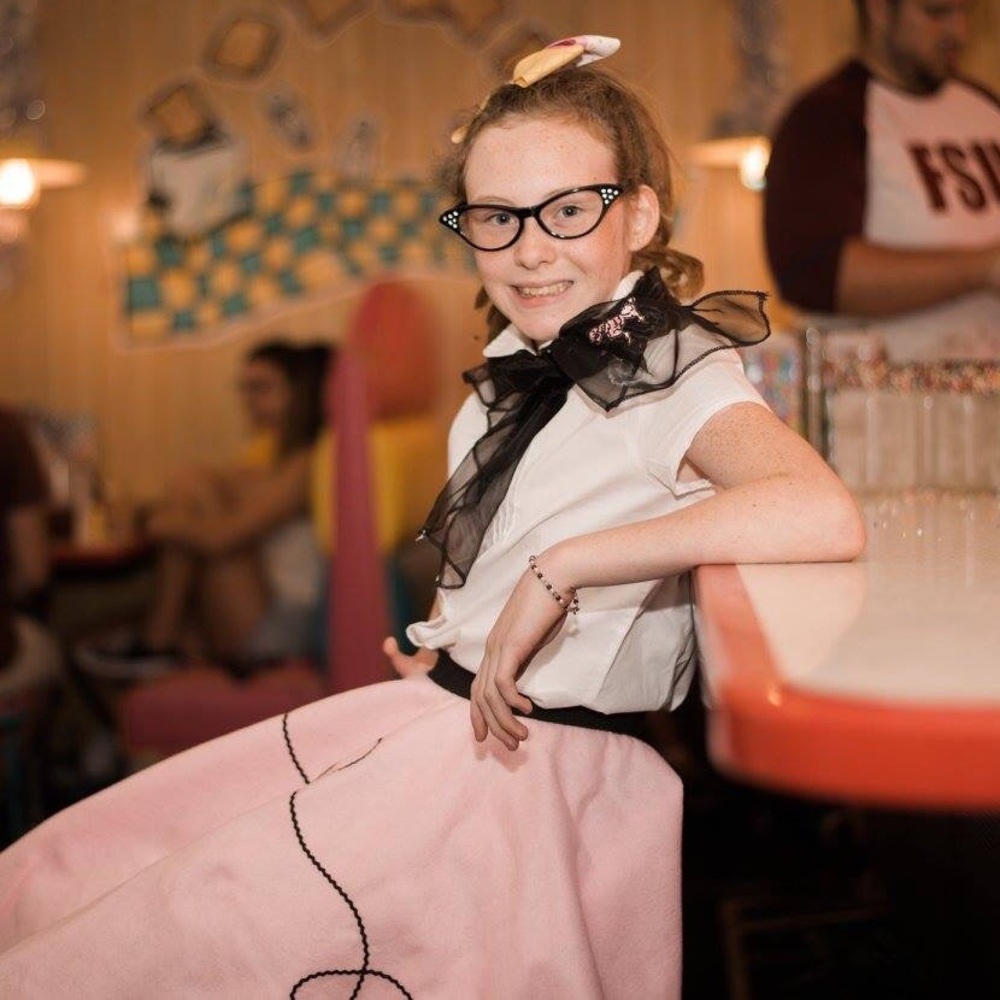 50s style pink poodle skirt outfit